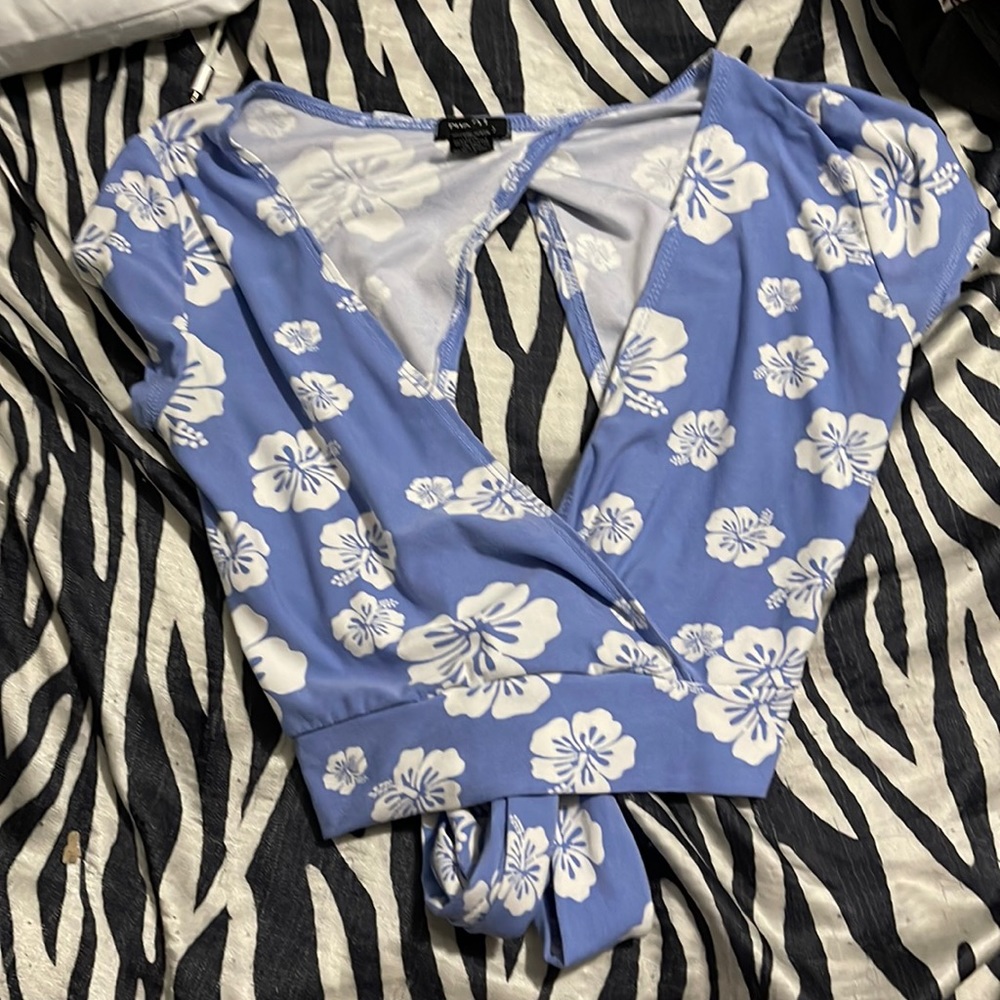 Light blue crop top with white hibiscus details